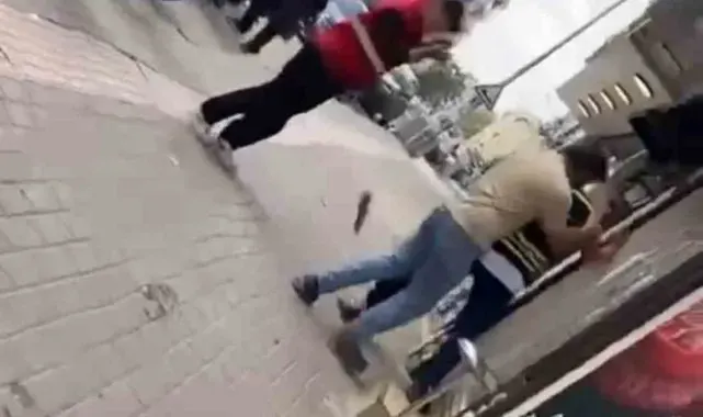 Bursa'da kuryelerin sopalı yumruklu kavgası kamerada