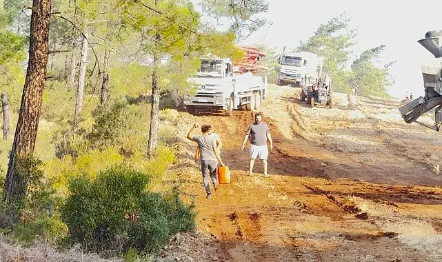 Fethiye Üzümlü'deki orman yangınında havadan ve karadan yoğun mücadele