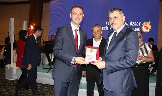 Aras Elektrik'e teşekkür plaketi
