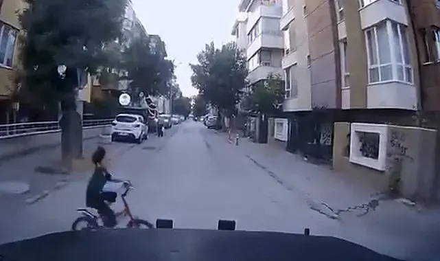 Ara sokaktan biranda çıkan çocuğa çarpmak üzereyken son anda durdu