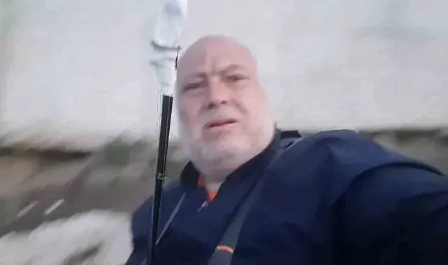 Meriç Nehri'nde yakaladığı 30 kiloluk yayın balığını nehirde oltası ile gezdirdi
