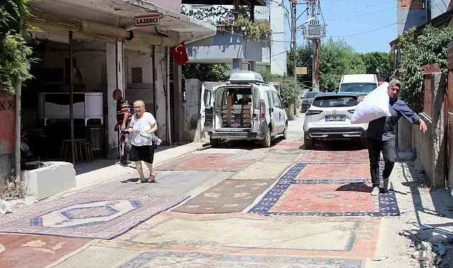 Mahallelinin toz isyanı: Yapılmayan yola halı serdiler